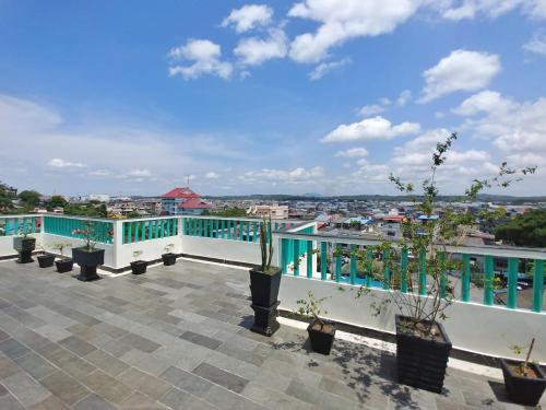 a view from the roof of a building with plants at Bintan Lumba Lumba Inn Hotel in Tanjung Pinang 