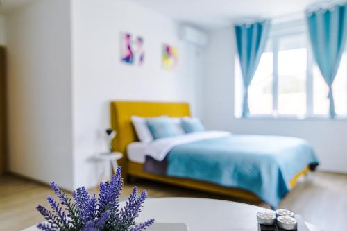 Postel nebo postele na pokoji v ubytování Apartmani Moon