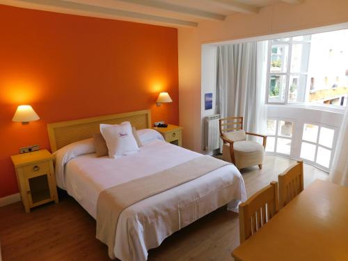 Cama o camas de una habitación en Hotel Palacete