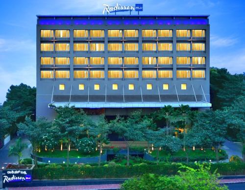 an exterior view of the radisson hotel singapore at Radisson Blu Bengaluru Outer Ring Road in Bengaluru