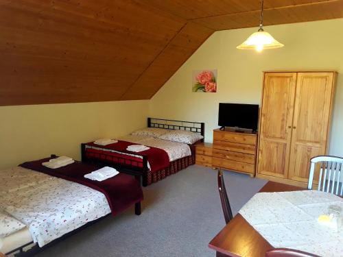 A bed or beds in a room at Villa Hedi