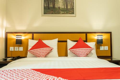 Ένα ή περισσότερα κρεβάτια σε δωμάτιο στο Hokkie Hotel Punggur Batam