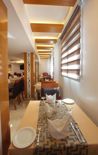 Posezení v ubytování Hotel Park Residency Calicut