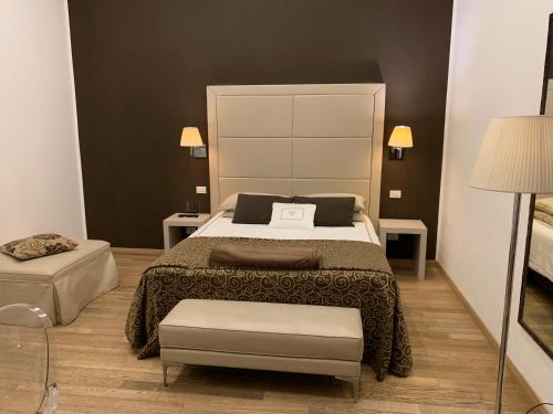 Кровать или кровати в номере Suite 70