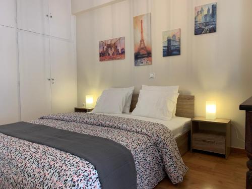 Posteľ alebo postele v izbe v ubytovaní Thiseio Big Apartment