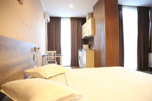 Postel nebo postele na pokoji v ubytování Hotel Soft