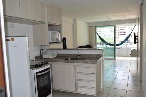 Virtuvė arba virtuvėlė apgyvendinimo įstaigoje VIP Beira Mar Residence