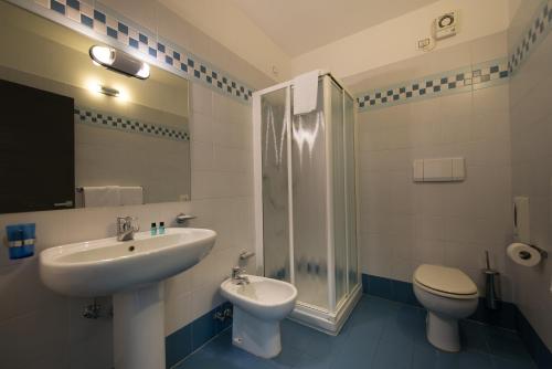 Ett badrum på Residence Centro Vela