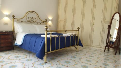 A bed or beds in a room at Filù Rooms Paradise Tower