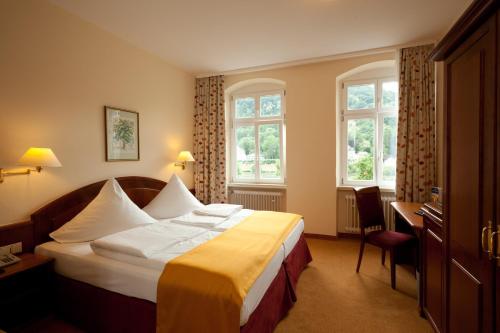 Postel nebo postele na pokoji v ubytování City Partner Hotel Holländer Hof