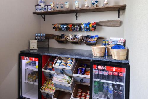 a refrigerator filled with lots of food and drinks at Anchored Inn at Hidden Harbor in Deale