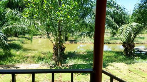 a view of a river from a porch at Home No.9 in Ko Lanta