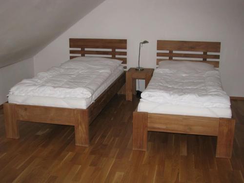 Postel nebo postele na pokoji v ubytování Obora 827 Nova Bystrice