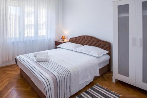 Posteľ alebo postele v izbe v ubytovaní Apartment Blaž