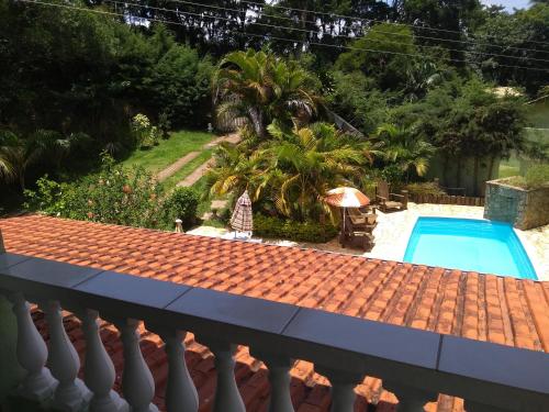 Uitzicht op het zwembad bij Recanto dos Sonhos of in de buurt