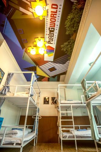 Ένα ή περισσότερα κρεβάτια σε δωμάτιο στο 123 Cheers Hostel