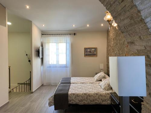 Foto PINTOR MASSANET - Casa de piedra adaptada en LEscala 6