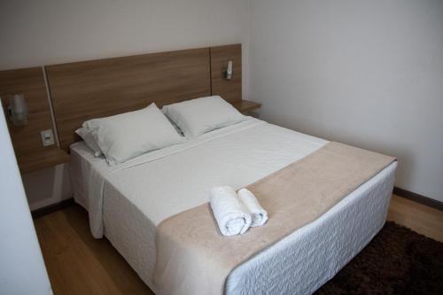 Ένα ή περισσότερα κρεβάτια σε δωμάτιο στο Maximus Business Hotel