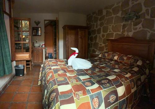 Ένα ή περισσότερα κρεβάτια σε δωμάτιο στο Hotel Casa del Anticuario