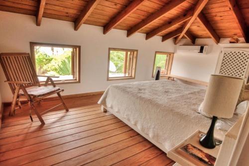 Postel nebo postele na pokoji v ubytování Villa Maxime