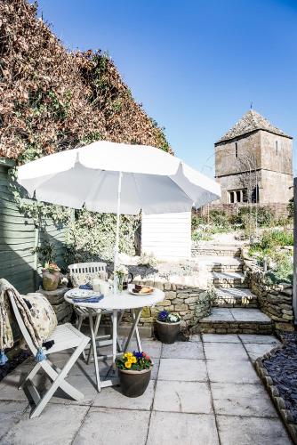 Taman di luar The Nook, Gretton (Cotswolds)