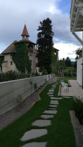 Κήπος έξω από το Residence Adler