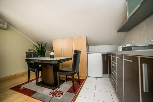 O bucătărie sau chicinetă la Residence Amelie