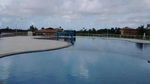a large pool of water with snow on the ground at Condomínio Resort Villa das Águas in Estância