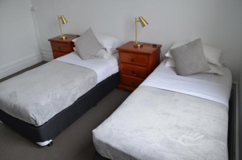Cama o camas de una habitación en Manly Beach Guesthouse