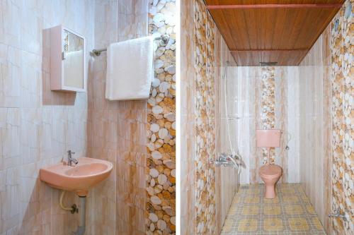 twee foto's van een badkamer met wastafel en toilet bij Honolulu Home in Cochin