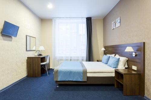 Katil atau katil-katil dalam bilik di 7 Kholmov Hotel