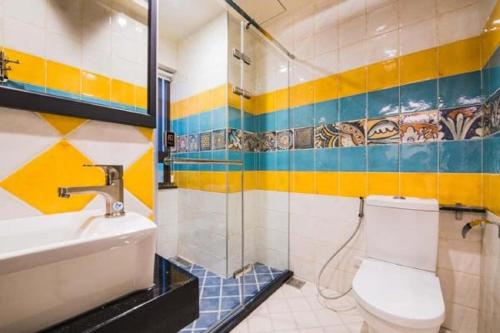 Ένα μπάνιο στο Happy Wing Guesthouse