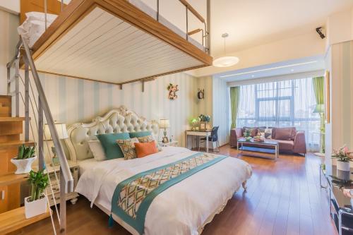 a bedroom with a large bed and a staircase at Westlake 7 Service Apartment in Hangzhou