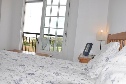 Una cama o camas en una habitación de Villa Canela with Heated Pool, Piscina Climatizada