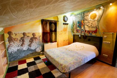 Un pat sau paturi într-o cameră la Anahuaska Art - Suites Temáticas