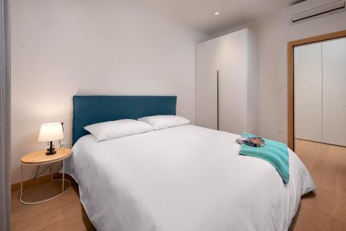 Postel nebo postele na pokoji v ubytování Jazz apartment Split