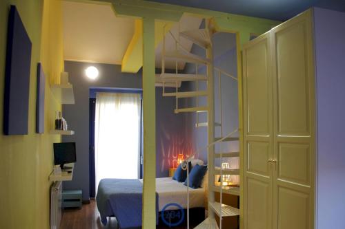 Katil atau katil-katil dalam bilik di Hospedium Aloque Posada Hotel Rural