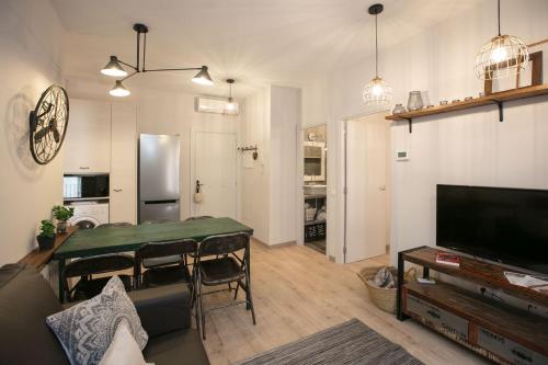 Μια τηλεόραση ή/και κέντρο ψυχαγωγίας στο Apartaments Cal Trumfo