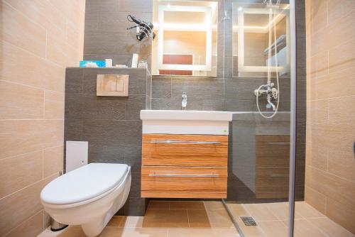 Ett badrum på Astana International Hotel