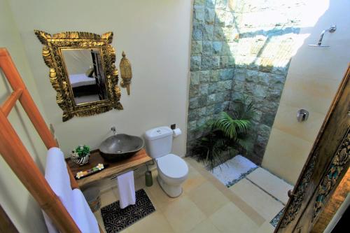 Ένα μπάνιο στο Hakuna Matata Bali Villas