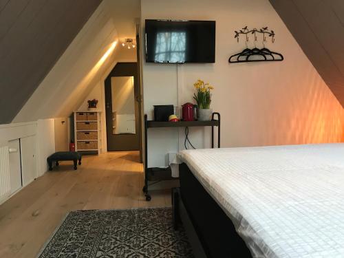 Postel nebo postele na pokoji v ubytování Nabij de Molen