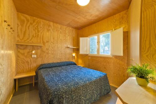 Posteľ alebo postele v izbe v ubytovaní Camping Lido