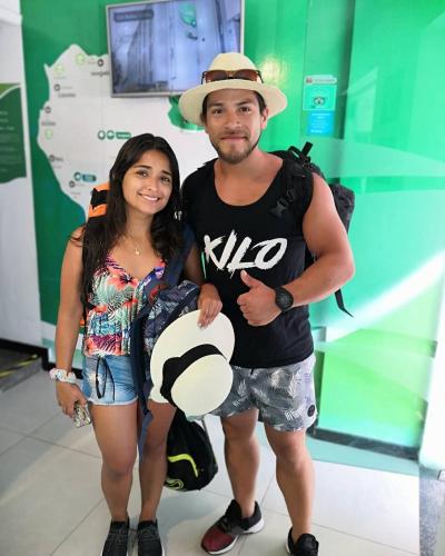 a man and a woman posing for a picture at Lulu Pousada Buzios in Búzios