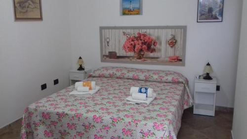 Ένα ή περισσότερα κρεβάτια σε δωμάτιο στο Otranto Le Sancinare