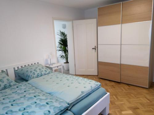 Ένα ή περισσότερα κρεβάτια σε δωμάτιο στο Villa Kruckau
