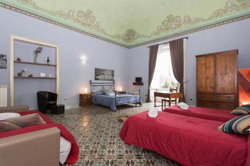 A bed or beds in a room at Antica Dimora