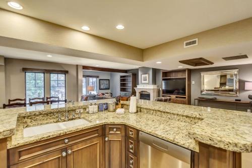 a large kitchen with a large granite counter top at The Chateaux Deer Valley in Park City