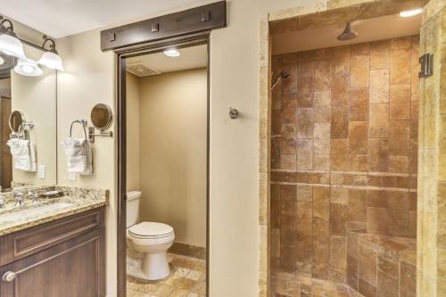 a bathroom with a toilet and a shower at The Chateaux Deer Valley in Park City