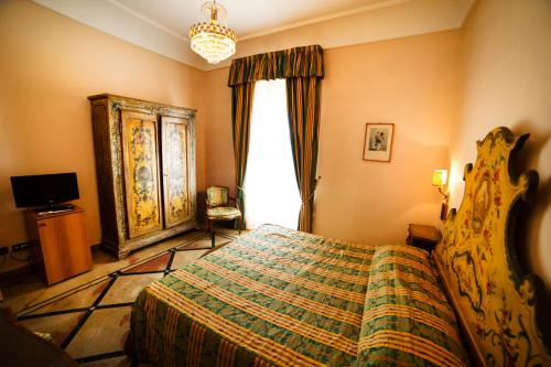 Postel nebo postele na pokoji v ubytování Grande Albergo Miramare
