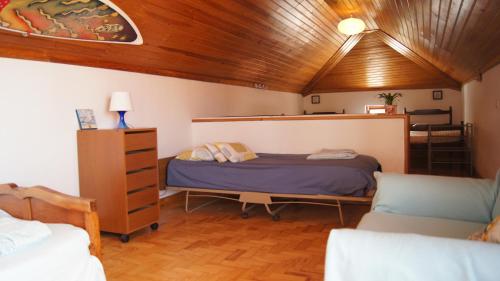 Postel nebo postele na pokoji v ubytování Family house Adraga